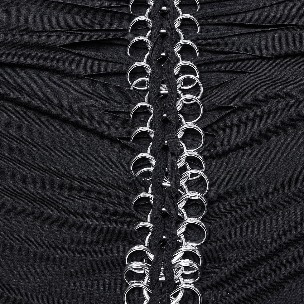 Extreme close-up of black metal O-rings and ruched lace-up back detail on gothic long sleeve top showing hardware craftsmanship