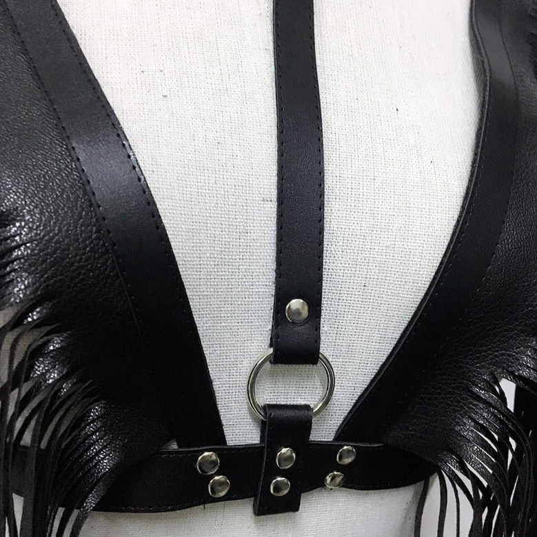 Black leather gothic chain crop harness modular pieces showing top and bottom components with adjustable closures and tassel details