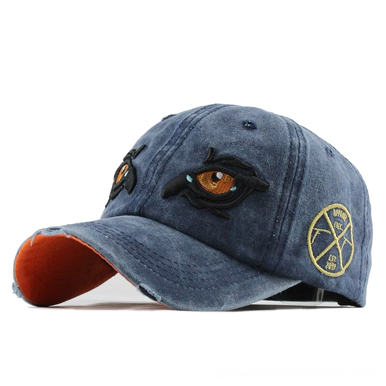 Navy blue gothic eagle eye embroidered baseball cap front three-quarter studio photography