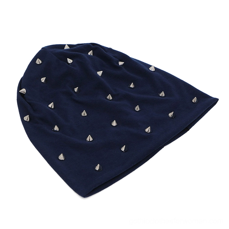 Navy blue gothic studded slouch beanie with evenly distributed silver metal cone studs, flat lay view