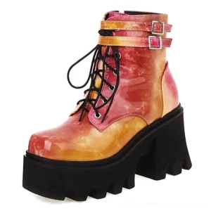 Ombre red orange patent leather gothic chunky platform ankle boots with side zipper and lug sole, front three-quarter view