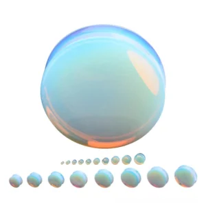 Opalite ear plugs gauges detail shot iridescent finish alternative gothic jewelry close-up