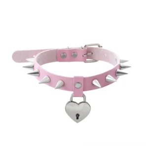 Pink heart spiked choker with silver hardware and lock pendant, flat lay display showing alternative fashion choker
