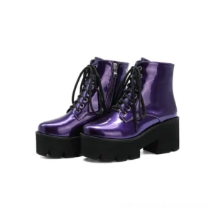 Purple patent leather gothic platform ankle boots with dual closure system, elevated platform sole, and architectural heel design