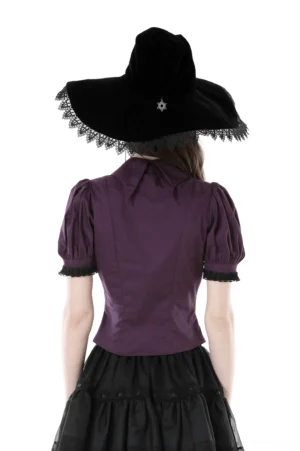 Rear full-body view of gothic blouse showing puff sleeves and lace-trimmed cuffs, witch hat detail, white studio background