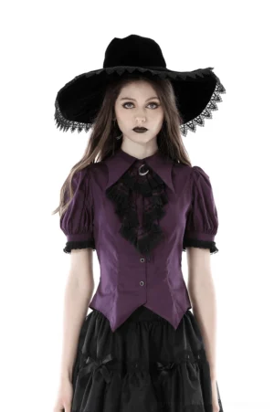 Front full-body view of purple gothic lace puff sleeve blouse with crescent moon brooch, paired with black witch hat and black skirt on female model