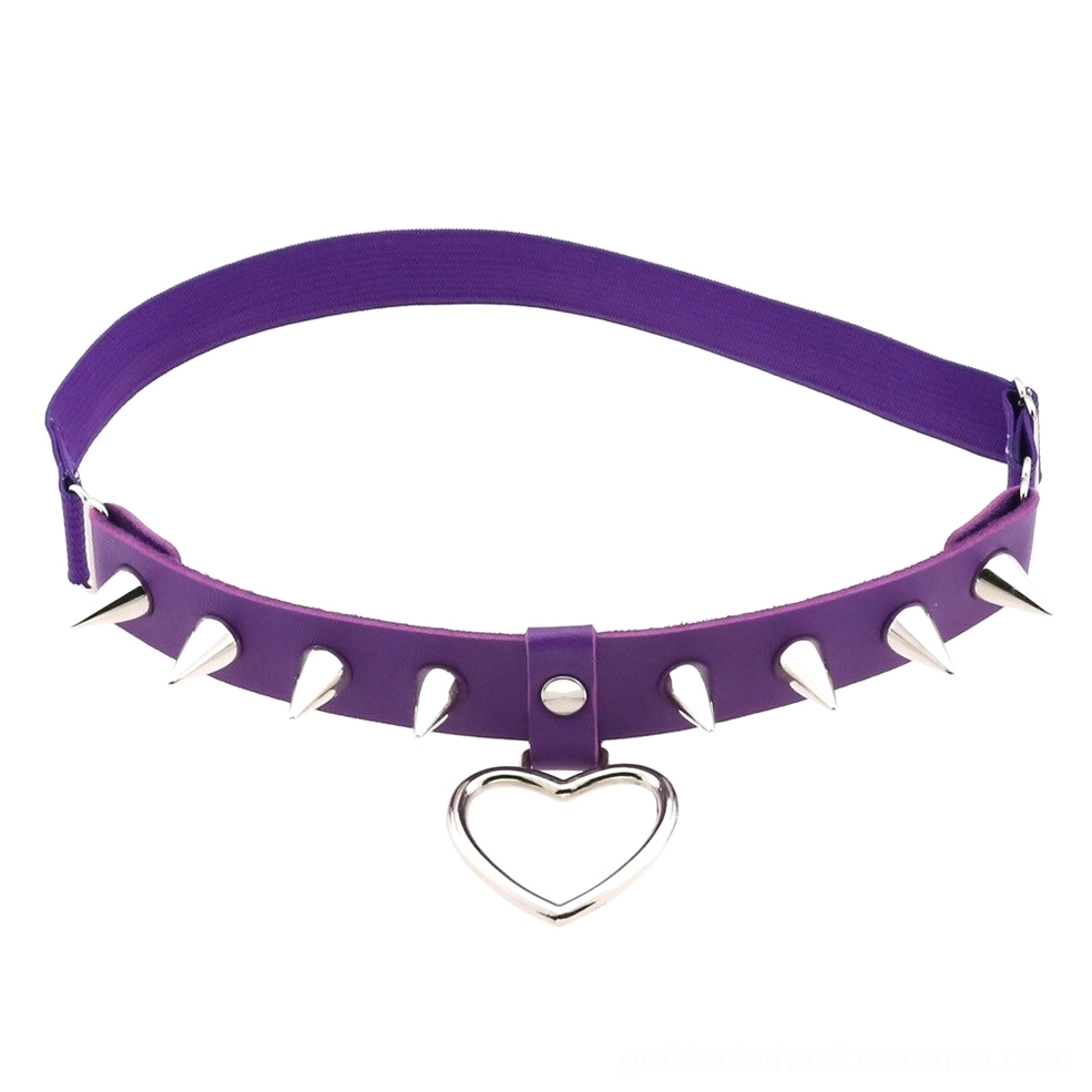 Purple elastic gothic leg garter belt with silver spikes and hollow heart detail, studio product photography