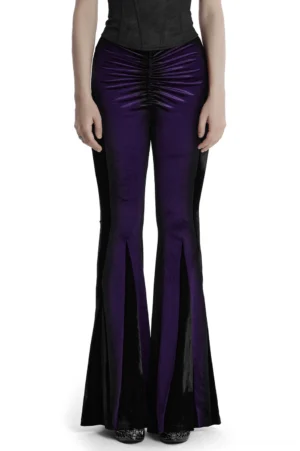 Purple velvet gothic flared pants front view worn by model, featuring high waist and adjustable cross-over straps