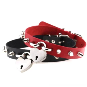 Red and black spike heart lock gothic choker necklace with matching key, studio product photography