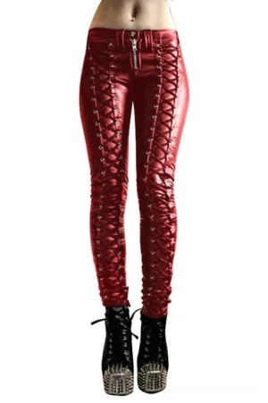 Women's red gothic lace-up PU leather skinny trousers with exposed zipper fly and front pleated design on white background