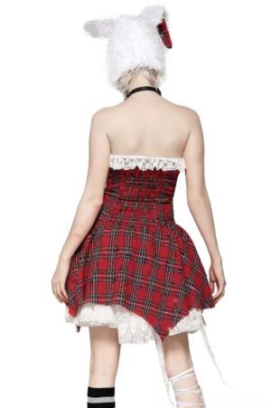 Back view of red tartan corset dress showing shirred ruched bodice and spaghetti straps on model