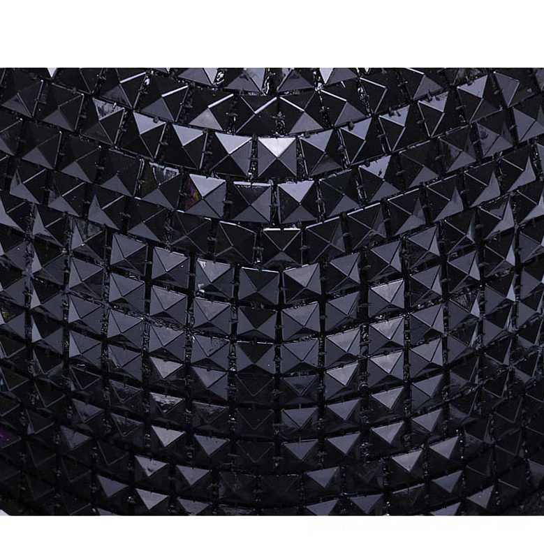 Red pyramid stud snapback cap side view demonstrating stud placement and cap structure