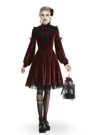Red velvet gothic dress with black lace cross neckline and puff sleeves - front view on model