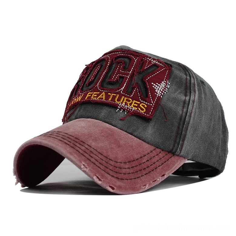Red vintage gothic snapback cap front three-quarter view with frayed brim and adjustable strap detail