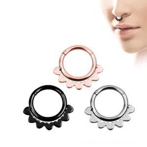 Three-color scalloped steel clicker nose rings in silver, rose gold, and black with hinged segment design - close-up frontal view on model