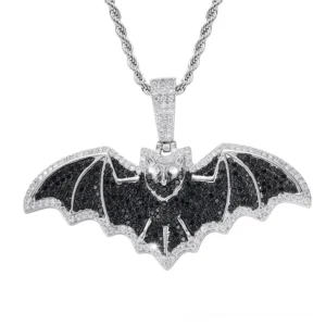 Silver pavé bat head pendant with black enamel gothic wings and twisted rope chain on white background