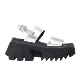 Silver and black gothic platform chunky sandals with metallic straps, adjustable buckle closure, and aggressive tread sole