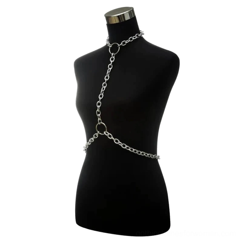 Silver chain body harness one-shoulder gothic design with curb links and O-ring connectors, three-quarter view on black mannequin