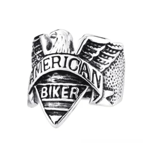 All-silver stainless steel eagle biker ring with engraved lettering and detailed eagle motif on white background