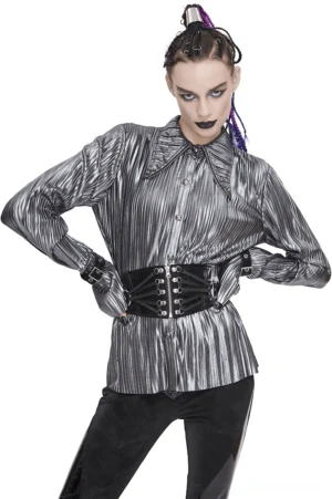 Silver metallic gothic blouse with pointed collar and ruffle sleeves, front three-quarter view on model with braided hair
