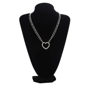 Silver hollow heart gothic chain necklace displayed on black jewelry mannequin, front view with curb chain design and silver-tone finish, festival fashion jewelry