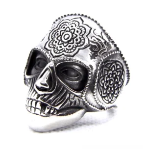 Silver mandala sugar skull gothic ring - left front oblique view showing intricate engraved floral patterns on vintage silver-tone metal