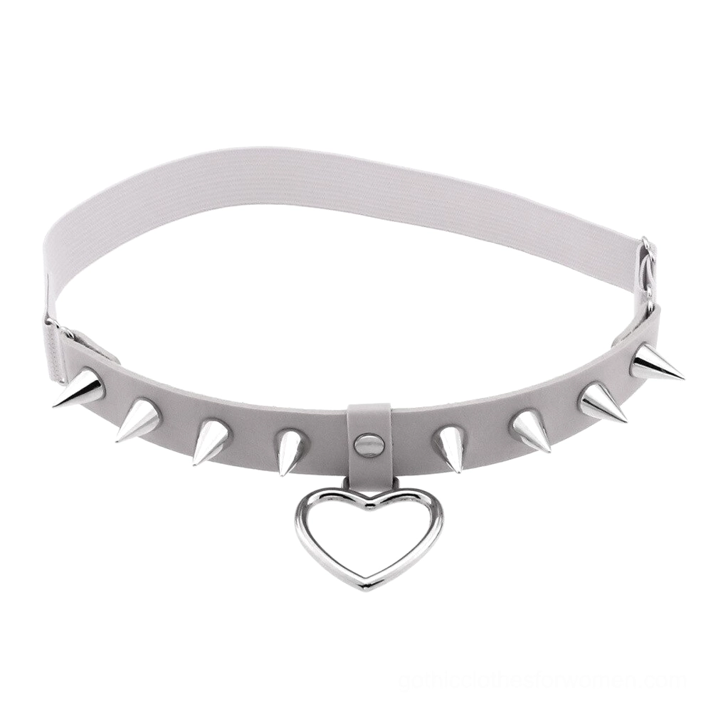 Silver metallic elastic leg garter with spike studs and heart charm, cyberpunk gothic fashion accessory