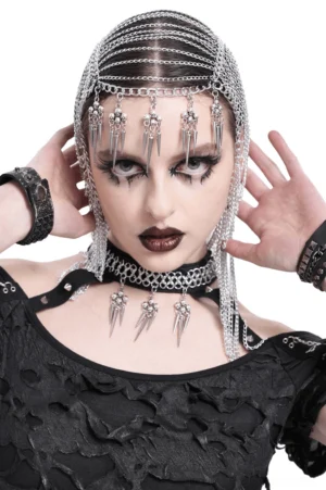 Silver gothic chain headpiece with spiked skull dangles worn by female model, front close-up studio view