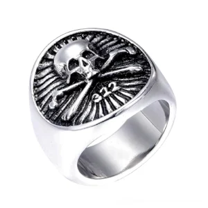 Silver skull pirate signet ring with radial striped texture and 322 engraving, top view close-up on white background