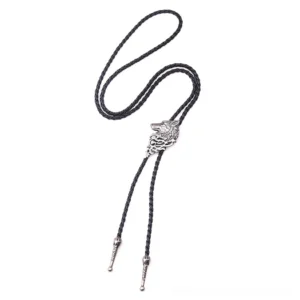 Silver wolf head gothic necklace pendant hanging vertically showing carved metal details and woven rope chain
