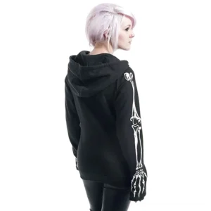 Black skeleton gothic fleece hoodie back view showing white skeleton bone prints on sleeves, worn by model with light pink hair