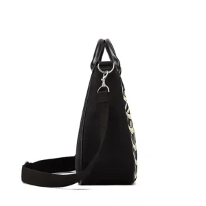Gothic skeleton bone tote bag side rear view - showing removable leather shoulder strap and partial anatomical print
