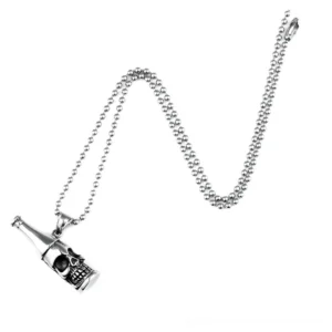 Skull bottle pendant with beaded metal chain gothic necklace - flat lay overhead view showing complete jewelry piece
