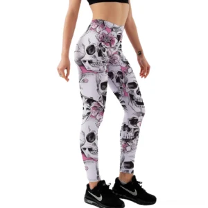 Women's skull and pink floral gothic leggings - left side front view worn by model on white background