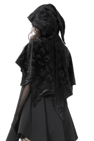Black skull print velvet cape back view, model wearing hooded gothic cape with irregular pointed hem and full embossed skull pattern
