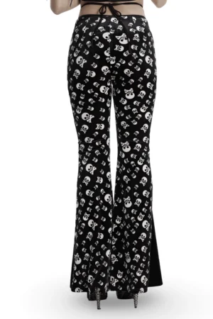 Skull print velvet gothic flared pants rear view showing allover skull pattern and back waist tie strap