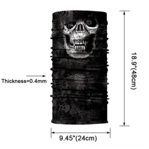 Seamless black skull printed biker bandana neck gaiter flat lay, rolled stacked form showing fabric texture and design detail