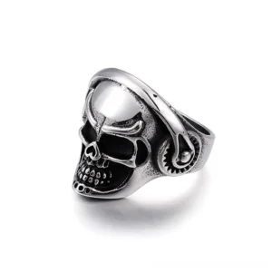 Punk skull biker ring three-quarter side view showing gear earphone accents