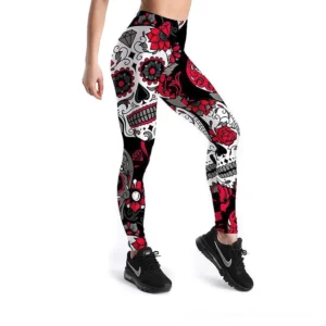 Red skull and rose gothic leggings with stretch fabric, side view showcasing slim fit design and vibrant print