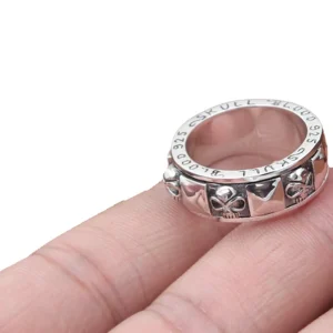 925 sterling silver skull spinner ring top close-up view showing rotatable mechanism and vintage silver finish