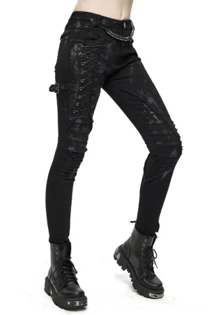 Black mottled steampunk skinny jeans with side lace-up panels, front view on model
