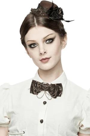 Steampunk brown bow tie choker worn on model with white collared blouse, showing ornate metal chain details and industrial gothic aesthetic