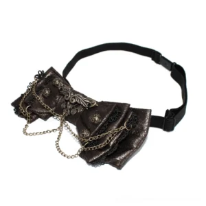 Top-down side view of brown steampunk bow tie choker displaying bronze faux leather and dangling metal chain embellishments