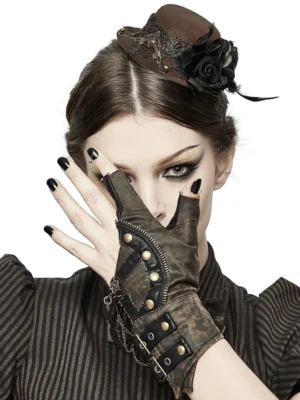 Close-up of steampunk glove showing zipper trim and antique brass rivets in distressed brown leather