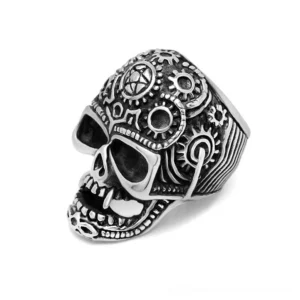 Steampunk skull gear ring with intricate engraved details, left front view on white background showing vintage silver stainless steel finish