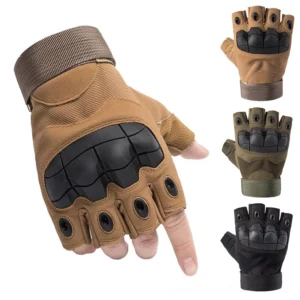 Tactical half-finger combat gloves with carbon fiber knuckle guards in tan, front close-up view showcasing protective design and hook-and-loop wrist strap