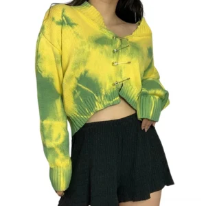 Tie-dye cropped cardigan displaying asymmetrical hem and ribbed cuffs detail, front medium view