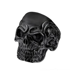 Matte black triple skull gothic ring frontal view, stainless steel alternative jewelry