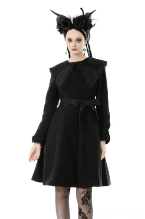 Victorian gothic black coat with embroidered lace collar and statement buttons - front full-body view worn by model