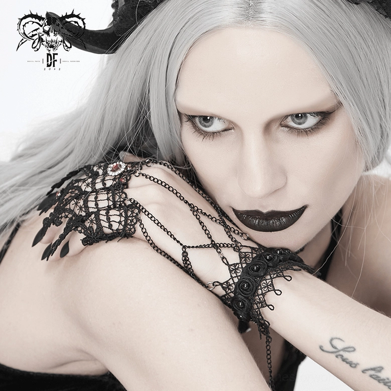 Victorian gothic black lace gloves displaying delicate craftsmanship and sophisticated darkwave styling elements